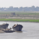 Boats on the Padma River. Agriculture, navigation, inland fisheries, and keeping saltwater intrusion at bay are all heavily dependent on the flow of water of these rivers.